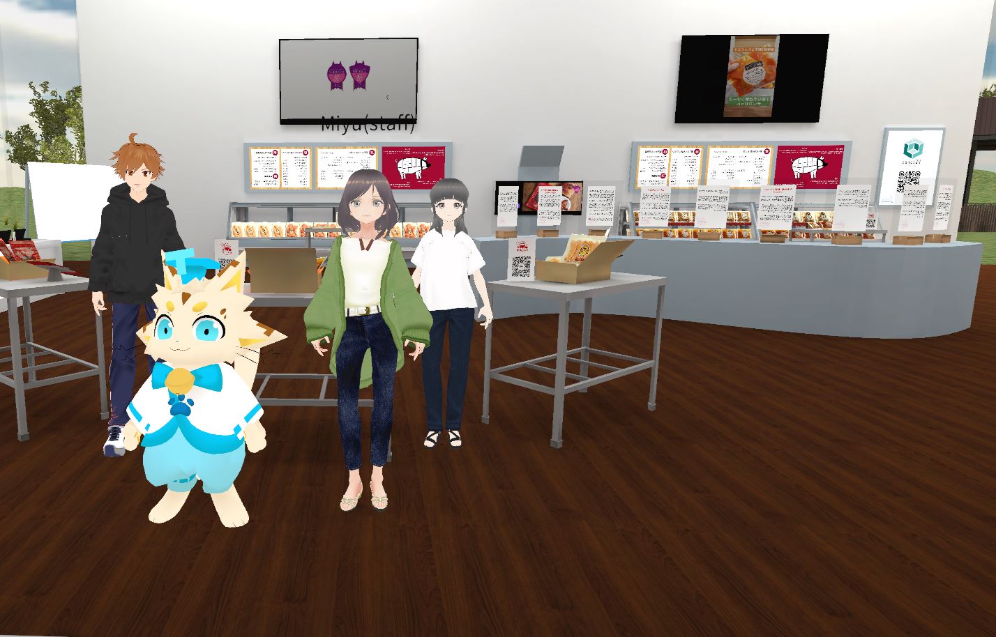 Avatars interacting with a virtual store staff member in VStores, offering a realistic store browsing experience.